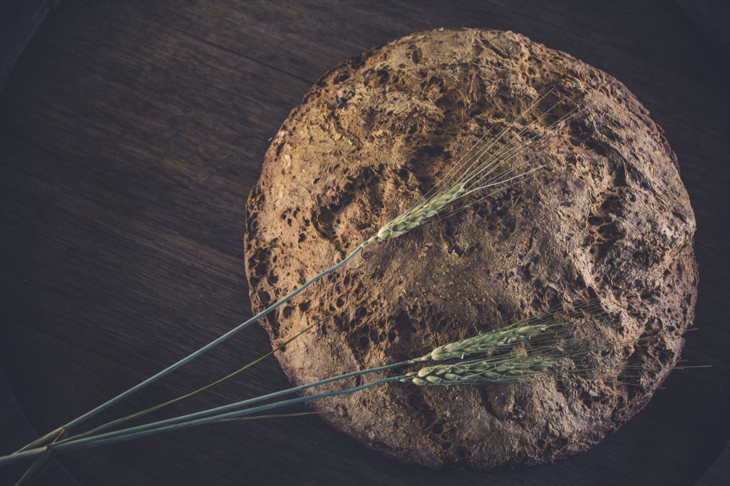 Homemade bread without yeast, gluten-free, baking powder. Eco bread with flax seeds and raisins made from rye flour.